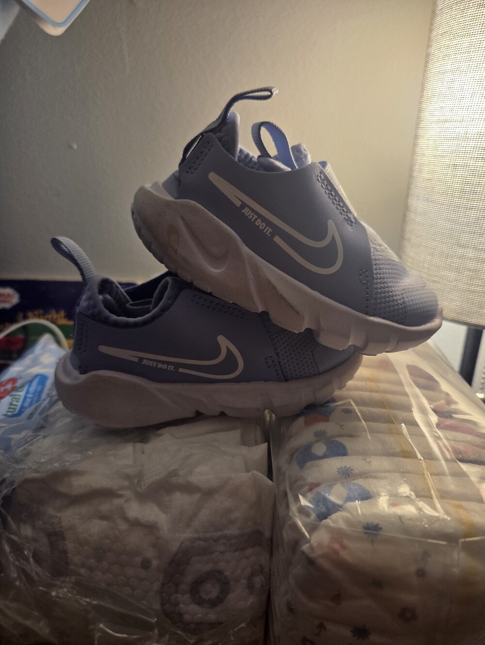 Nike Kids Slip-On Sneakers in Light Blue and White